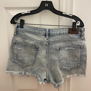 Distressed mini light denim shorts - size L